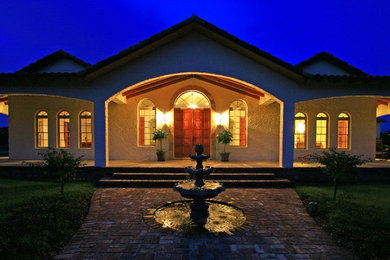 Tuscan exterior home photo in Orlando