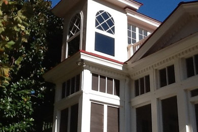 Example of a huge classic beige three-story mixed siding exterior home design in Nashville