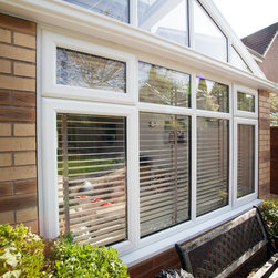 White Conservatory with PVCu Bi-Fold Doors - Products
