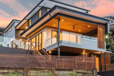 Trendy home design photo in Brisbane