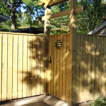 A stately entry to this Canadian home, including dark Bronze gate latch