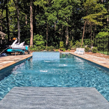 Gorgeous Glass Tile 360 Spillover Spa and lap pool