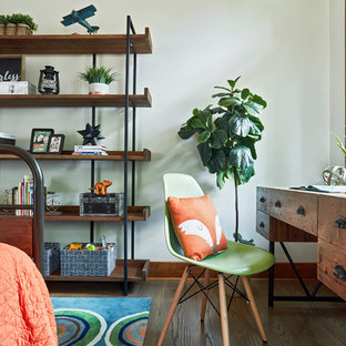This is an example of a medium sized rustic home office and library in Other with white walls, medium hardwood flooring, no fireplace, brown floors and a freestanding desk.