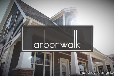 Inspiration for a craftsman multicolored mixed siding gable roof remodel in Chicago
