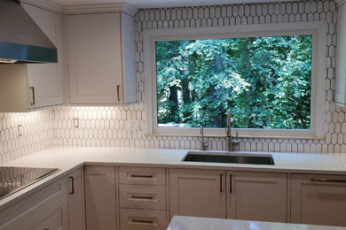 Example of a transitional kitchen design in Boston
