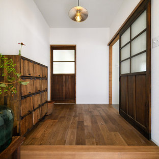 Photo of a shabby-chic style entryway.