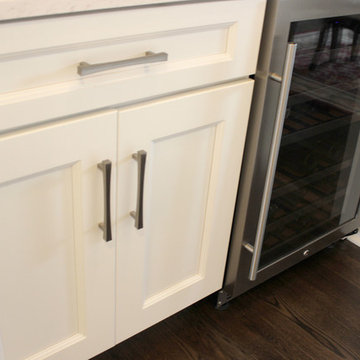 White Kitchen with Gray and Black Quartz Countertop and Bar Area ~ Streetsboro