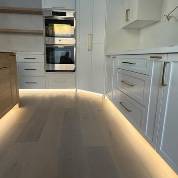 Multiple Room Cabinetry Reface with Partial Build