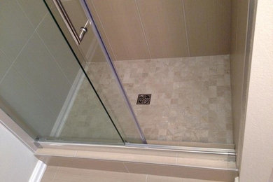 Small elegant kids' beige tile and ceramic tile ceramic tile alcove shower photo in Seattle with shaker cabinets, dark wood cabinets, a two-piece toilet, beige walls, an undermount sink and granite countertops