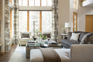 Transitional living room in Denver with white walls.