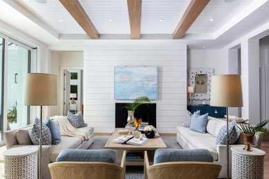 Design ideas for a coastal living room in Miami.