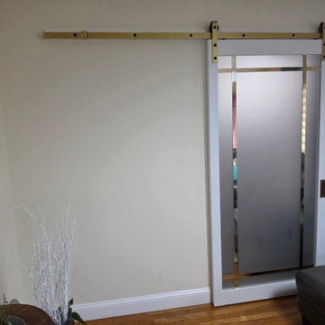 Barn door Planum 2112 White Silk with gold barn hardware and aluminum strips
