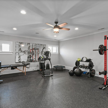 Luxury Modern Farmhouse Home Gym with Rubber Flooring & Power Rack