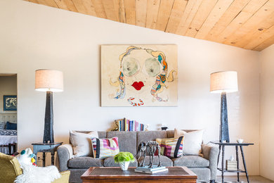 Example of a country open concept living room design in Albuquerque with white walls, no fireplace and no tv