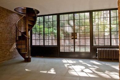 Living room - industrial living room idea in New York