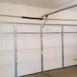 Torsion Spring Conversion - Door Hardware