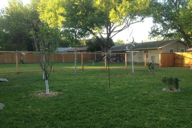 Design ideas for a traditional full sun backyard formal garden in Orange County.