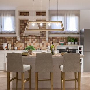 Inspiration for a large mediterranean walk-out basement in Milan with multi-coloured walls, terracotta flooring and pink floors.