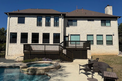 Inspiration for a small timeless backyard wood railing deck remodel in Austin