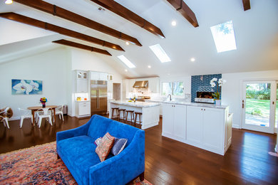 Kitchen - large kitchen idea in New York with stainless steel appliances and two islands