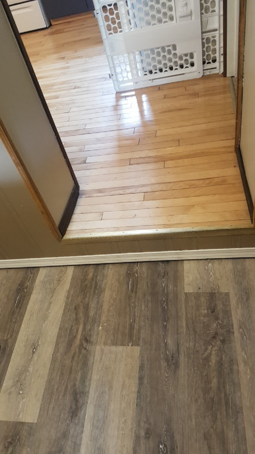 Help!!! LVP and different hardwood in the house what to do next?