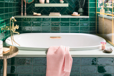 Inspiration for a mid-sized eclectic master green tile and porcelain tile porcelain tile, white floor, double-sink, vaulted ceiling and wallpaper bathroom remodel in Chicago with beaded inset cabinets, light wood cabinets, pink walls, an undermount sink, quartz countertops, green countertops and a built-in vanity