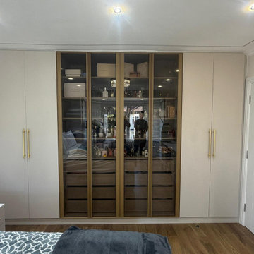 Luxury Bespoke Fitted Wardrobes with Smoked Glass Display Centre | London