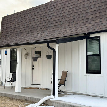 Modern Black & White Exterior | Board and Batten Siding with Black Windows