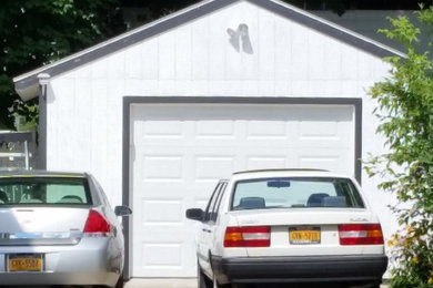 Inspiration for a mid-sized detached one-car garage remodel in New York