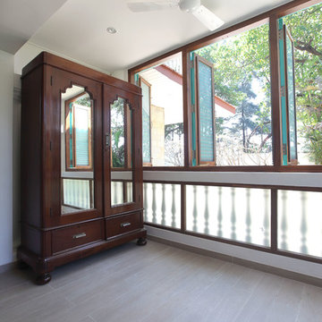 an antique cupboard in the guest bedroom