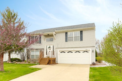 Example of a transitional exterior home design in Detroit