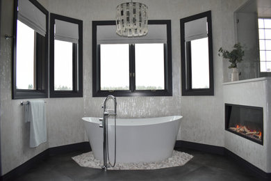 Example of a large minimalist ceramic tile, single-sink and wallpaper bathroom design in Denver with furniture-like cabinets, blue cabinets, granite countertops, a hinged shower door and a floating vanity