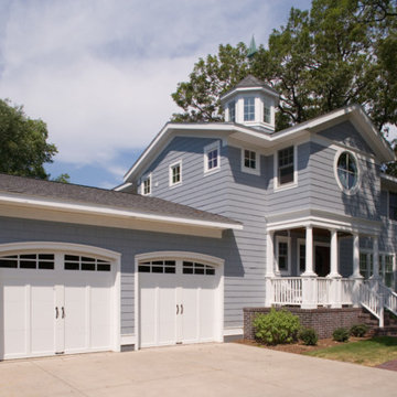 Beautiful Traditional Blue Wooden Siding Suburban Home - White Windows & Frames