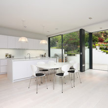 Modern Mid Sized Kitchen With Detached Table For Informal Eating