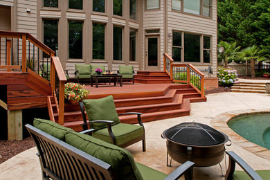 Mid-sized transitional backyard deck photo in Atlanta with no cover