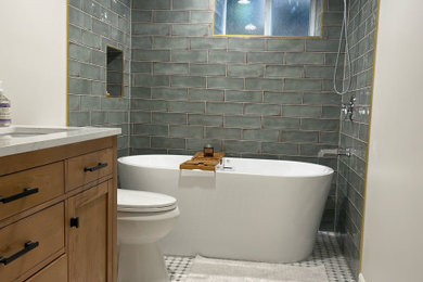 Bathroom - mid-century modern master green tile and ceramic tile mosaic tile floor, green floor and double-sink bathroom idea in Salt Lake City with shaker cabinets, brown cabinets, a two-piece toilet, white walls, a drop-in sink, quartz countertops, white countertops, a niche and a freestanding vanity