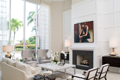 Inspiration for a large transitional open concept living room remodel in Miami with gray walls