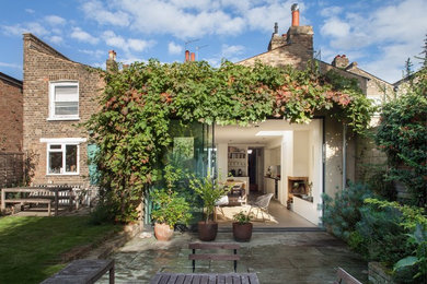 Design ideas for a transitional brick exterior in London.