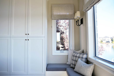 Transitional home design photo in Calgary