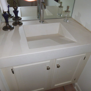 Cast in place concrete counters & Ramp sink slot drain