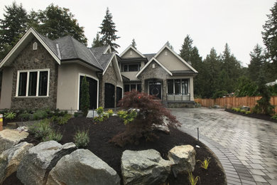 Example of a transitional exterior home design in Vancouver