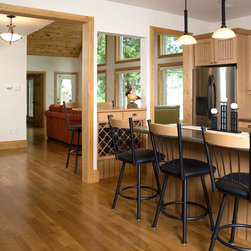 Kitchen with Wine-tasting Bar - Hardwood Flooring