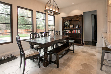 Inspiration for a large mediterranean kitchen/dining combo in Sacramento with ceramic floors.