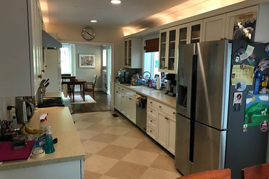 Example of a classic galley eat-in kitchen design in Other