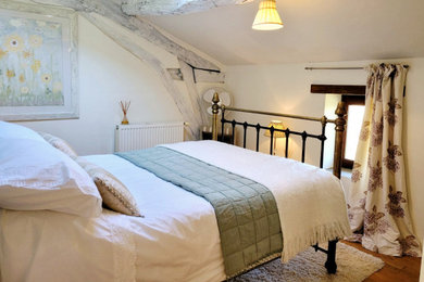 This is an example of a traditional bedroom in Wiltshire.
