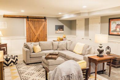 Mid-sized country walk-out porcelain tile basement photo in Baltimore with gray walls