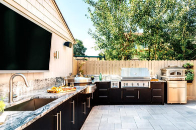 Inspiration for a large transitional l-shaped eat-in kitchen remodel in Denver with no island