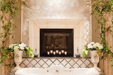Inspiration for a contemporary beige tile drop-in bathtub remodel in Houston