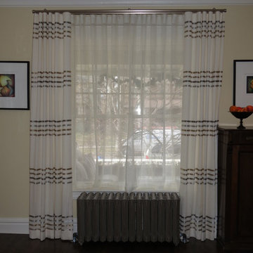 Ripplefold sheer drapes with Ripplefold inoperable overdrapes