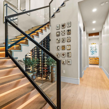 Staircase with LED-Lit Risers and Wine Display